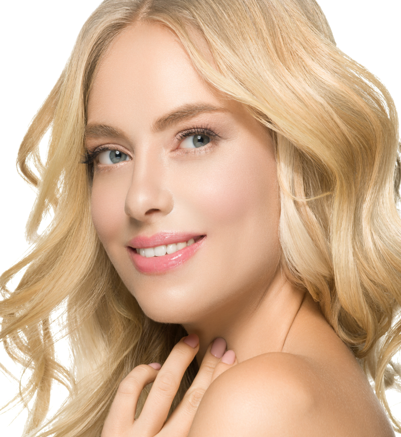 Smiling woman with wavy blonde hair and natural makeup, showcasing confidence and beauty, representing expert hair services at Kylie Studio Salon in Bethesda, MD.